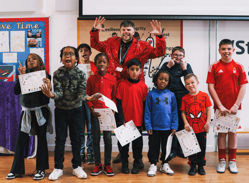 Ben Jackson with students at Bluecat Primary Academy
